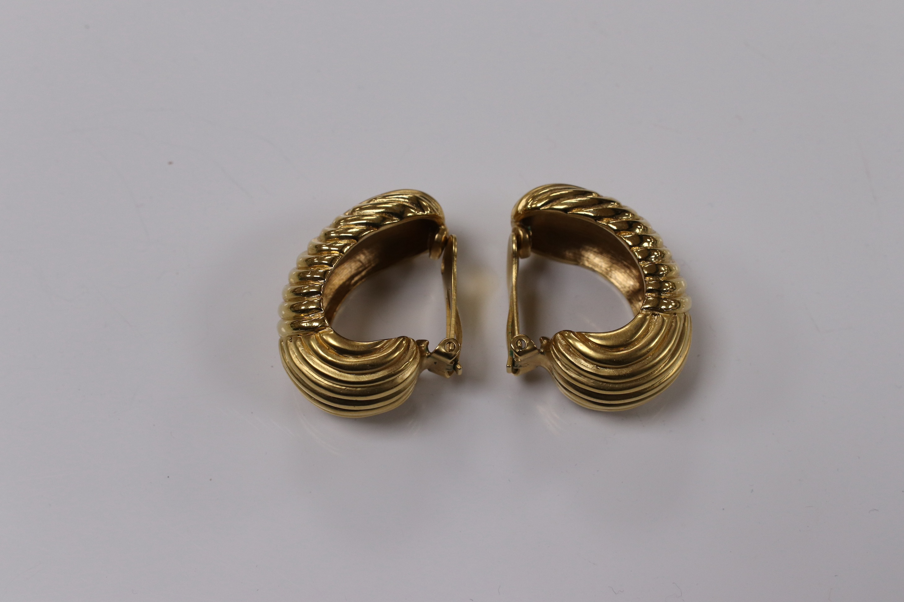 A pair of Valentino gold plated fluted demi-lune ear clips, 36mm. Condition - fair